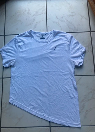 Tshirt asymétrique Gymshark taille M couleur blanc, marque: Gymshark, état: Très bon état, taille: M / 38 / 10, 11,00 €, 12,25 € Protection acheteurs (Pro) incluse