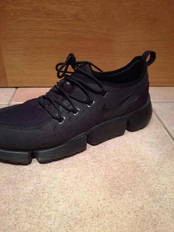 Nike pocket fly noir online