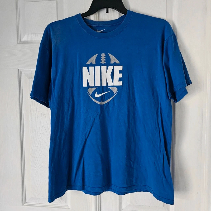 Nike football print tshirt
Size medium 1