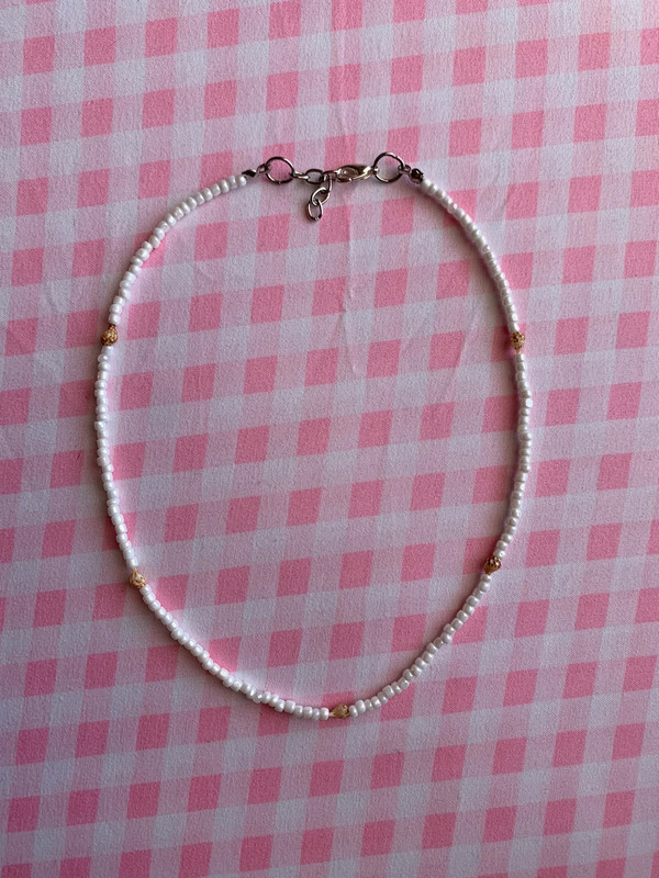 white beaded necklace with seashells 1