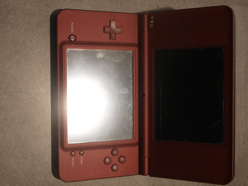 nintendo ds i xl rouge avec pochette et 8 jeux 2