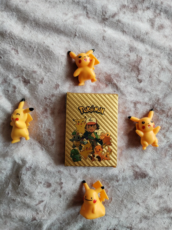 Gold pokemon card box and figures 1