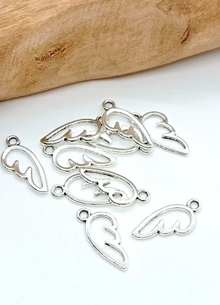 Lot de 10 breloques ailes argentées (BRE-35), marca: Breloques, estado: Muito bom, €1.00, €1.75 inclui Proteção do Comprador Pro