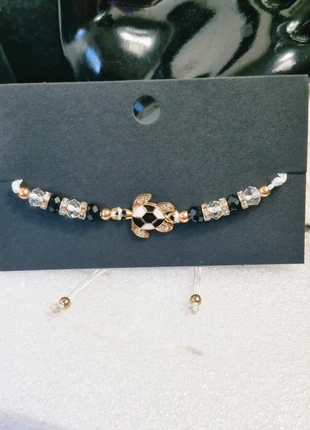 Bracelet fantaisie tortue noir et blanc / doré, marque: Fantaisie, état: Neuf sans étiquette, 2,99 €, 3,84 € Protection acheteurs incluse