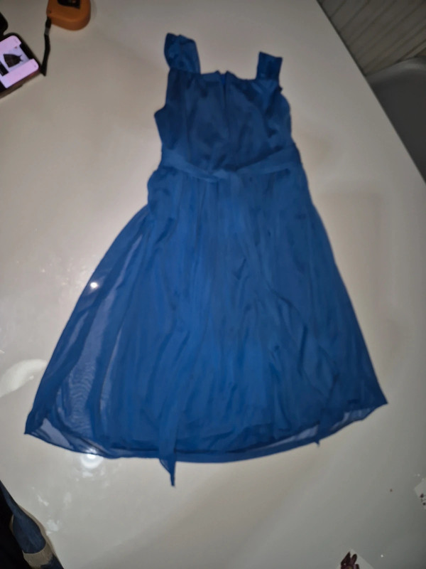 Śliczne niebieska sukienka na siedem osiem lat 4