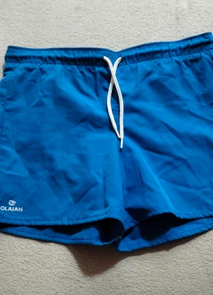 Bañador azul infantil con cordón blanco, merk: Olaian, staat: Heel goed, maat: 10 jaar / 140 cm, € 2,00, € 2,80 inclusief Kopersbescherming