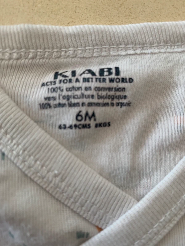 Lot de 2 bodys nike et kiabi 6 mois - photo numéro 3