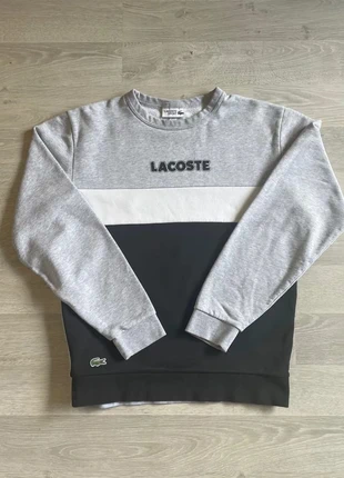 Pull Lacoste col rond gris, blanc et noir taille Xs, marque: Lacoste, état: Très bon état, taille: XS, 30,00 €, 32,20 € Protection acheteurs incluse