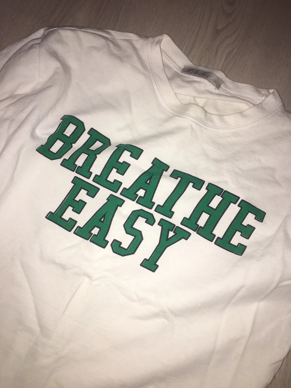 Camisetas blancas y verdes on sale