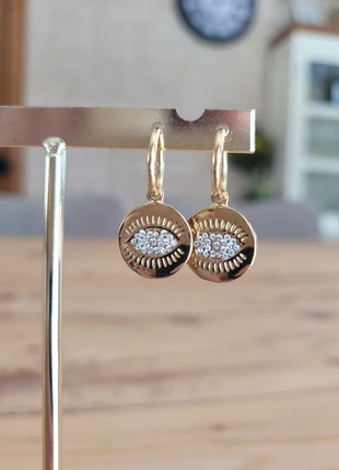 Boucles d'oreilles oeil de protection doré en acier inoxydable, brand: Satine, condizioni: Ottime, €9.00, €10.15 include la Protezione acquisti