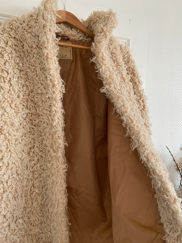 Manteau creme fausse fourrure mouton