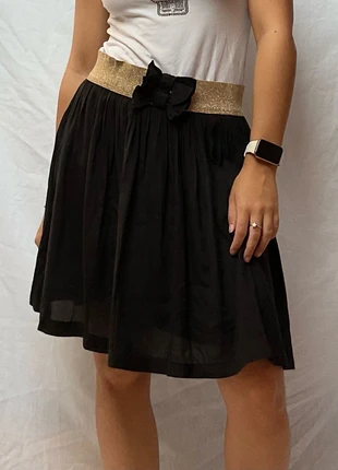 Jupe de fête or et noir à noeud sandro taille 2/38/M en très bon état, marke: Sandro, zustand: Sehr gut, größe: M / 38 / 10, 35,00 €, 37,45 € inklusive Vinted-Käuferschutz