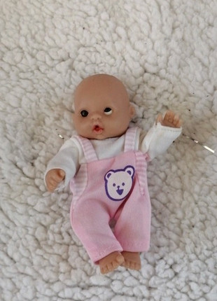 Jouet poupon dans son trotteur Vinted