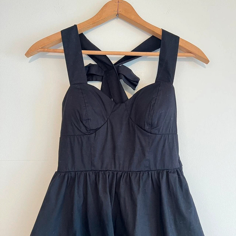 Black corset style mini dress with bow on back 5