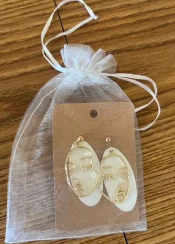 White clay earrings 1