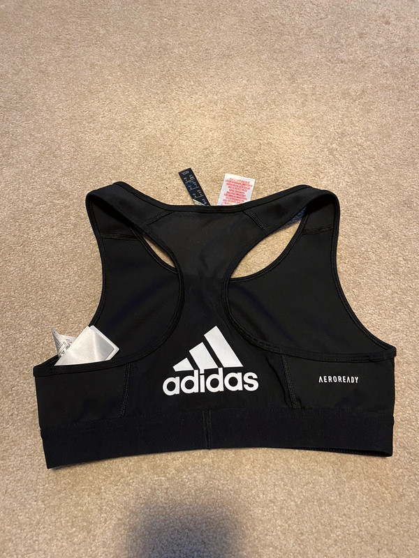 Adidas sports bra size 13 years but would fit womens s Yodel or