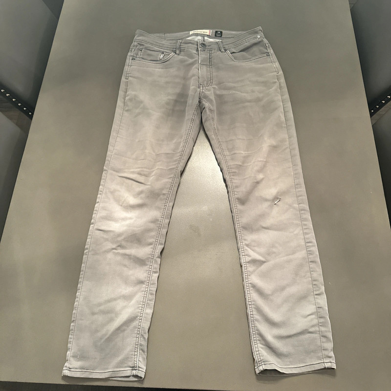 grey straight leg jeans. brand is depart west 1