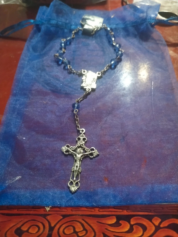 Beautiful NWT blue rosary Saint bracelet. 1