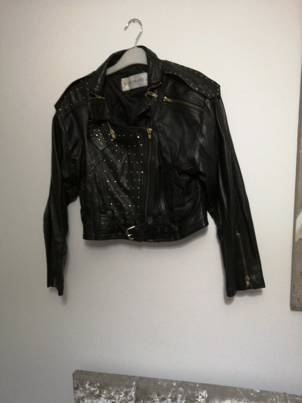 Vintage Black leather jacket with gold studs. Not seen similar so  definitely a 'one off bargain'