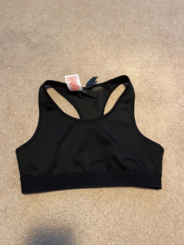 Adidas sports bra size 13 years but would fit womens s Yodel or Royal Mail  only