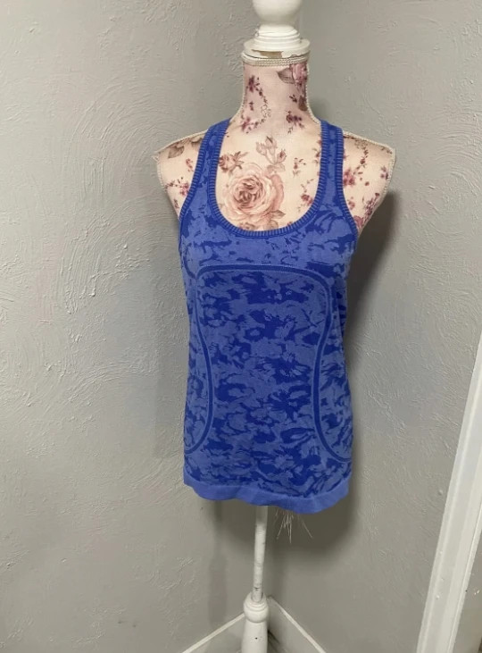 swiftly tech tank top Used  Good condition  Size 8 1