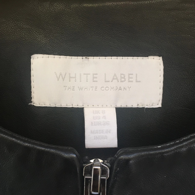 The white store company leather jacket