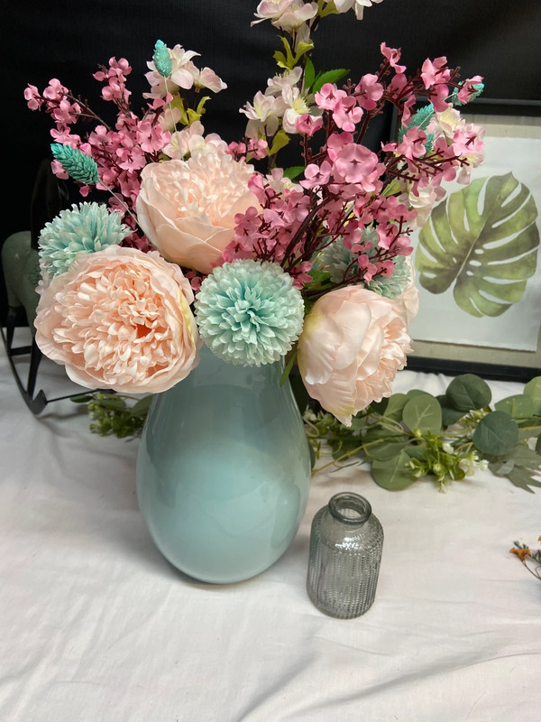Large pretty pastel blue vase with matching pastel pink and blue arrangement