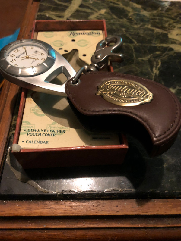 Remington pocket watch with leather outlet case