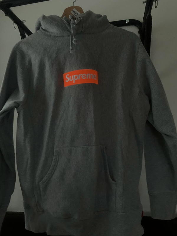 Grey and orange box top logo