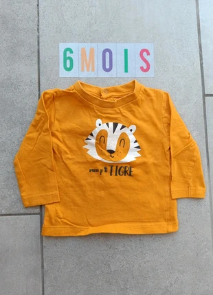 T shirt manche longue, merk: Kimadi, staat: Heel goed, maat: 6-9 maanden / 68 cm, € 2,00, € 2,80 inclusief Kopersbescherming