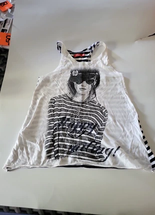 Debardeur , brand: Tissaia, condition: Good, size: 10 years / 140 cm, €1.00, €1.75 includes Buyer Protection