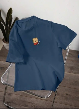 T-shirt bleu avec imprimé cartoon, simple et original, merk: Vintage Dressing, staat: Nieuw zonder prijskaartje, maat: XL, € 10,00, € 11,20 inclusief Kopersbescherming