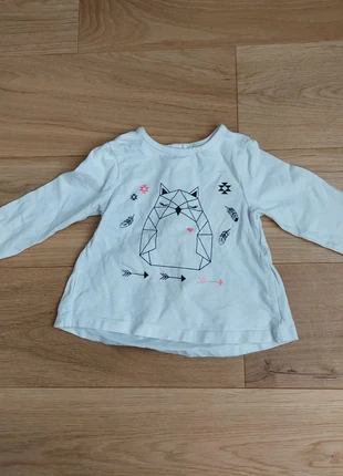 Ongedragen bloesje met strikje achteraan , merk: Orchestra, staat: Nieuw zonder prijskaartje, maat: 6-9 maanden / 68 cm, € 1,00, € 1,75 inclusief Kopersbescherming