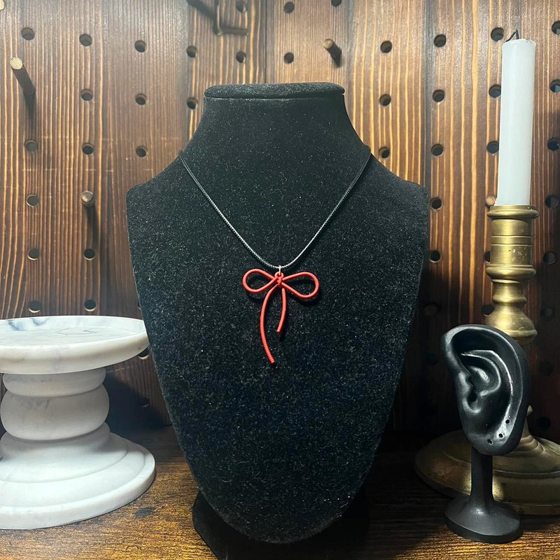 handmade coquette indie black cord necklace with red bow pendant 2