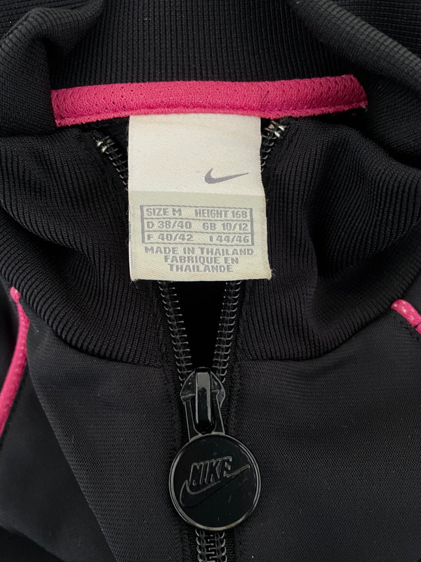 Nike sexy black sport jumpsuit high neck zipper front hot pink piping details wide legs. M Vinted