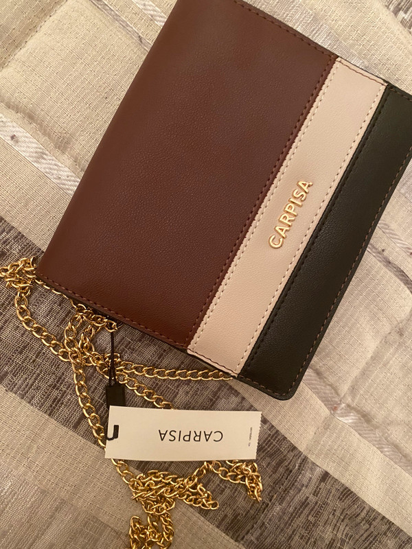 Pochette 2025 oro carpisa