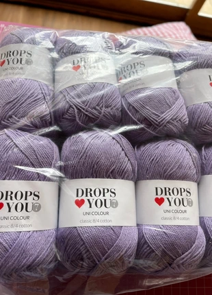 20 novelos cor 40 lilás, marca: Drops, estado: Novo com etiquetas, €20.00, €21.70 inclui Proteção do Comprador