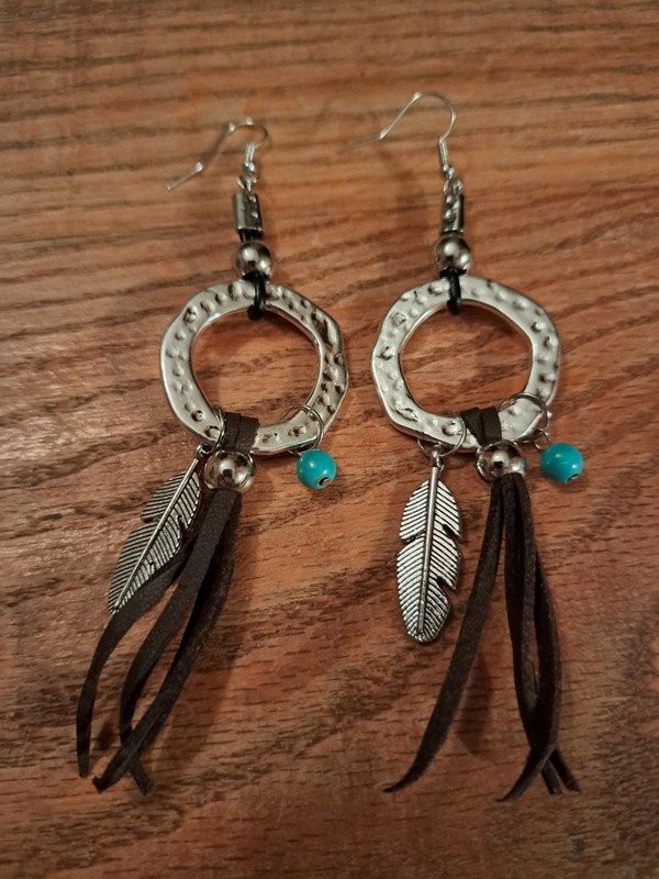 Silver earrings with brown detail and feather charm 2