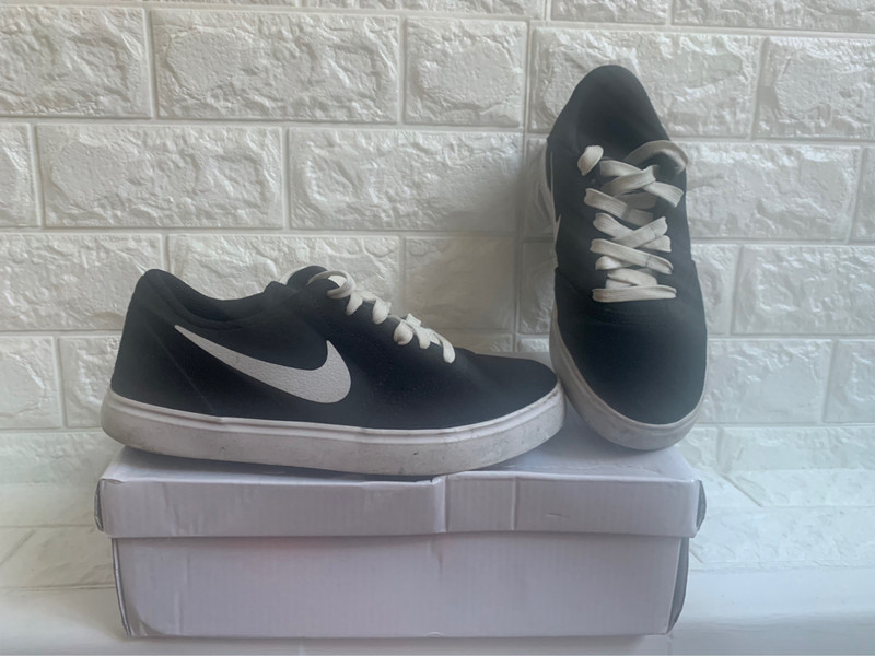 Nike canvas 2024 negras