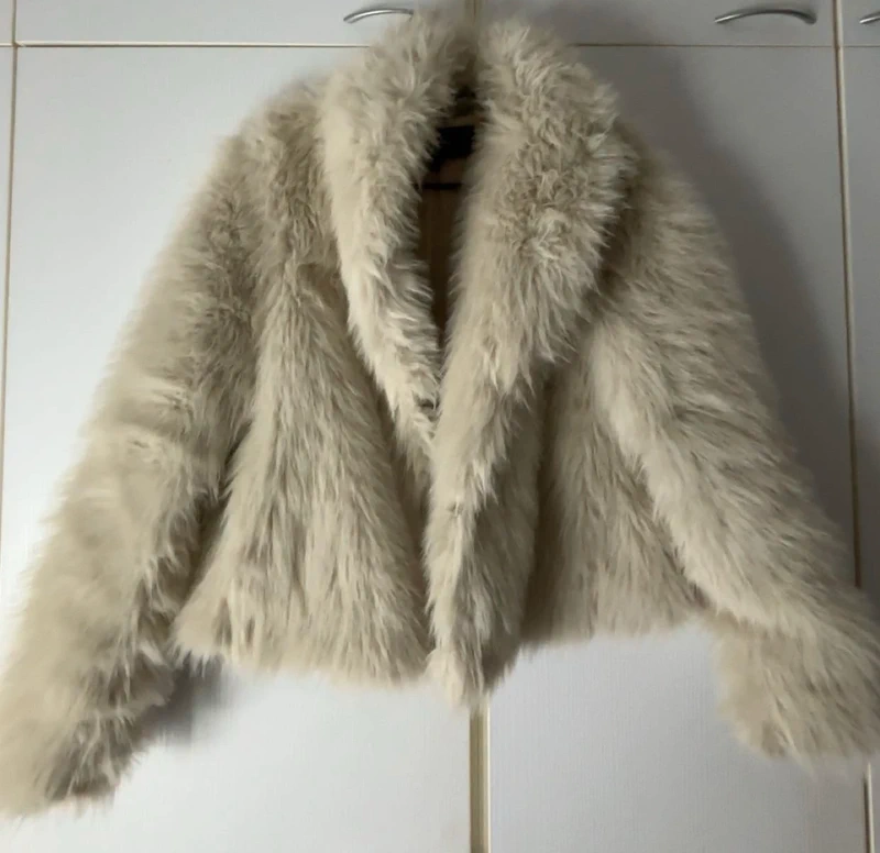 Light faux fur coat