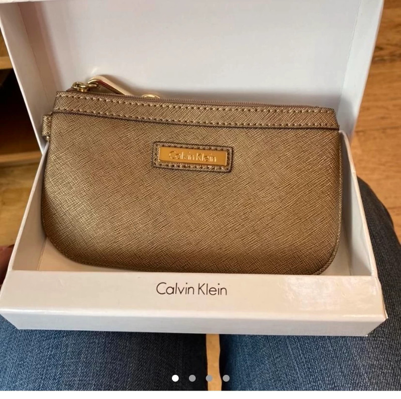 Brand New With Box Gold Bronze Calvin Klein pouch clutch purse. Vinted