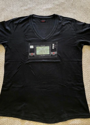 Tshirt preta gola em bico Zara Game Over/ Vneck black Zara T-shirt Game Over, marca: Zara, estado: Bueno, tamaño: XL, 8,00 €, 9,10 € Protección al comprador incluida