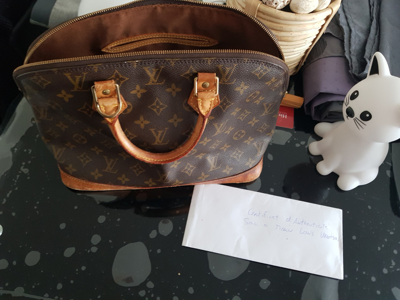 Sac alma sales louis vuitton occasion