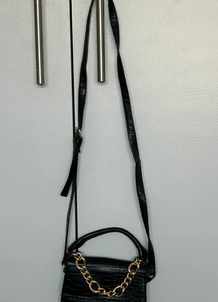 Small black crossbody bag with top handle, brand: Primark, condition: Good, €2.00, €2.80 includes Buyer Protection