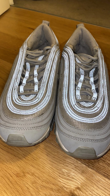 97s reflective top