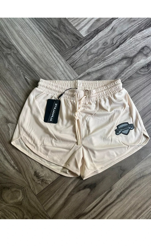 NEW Alphalete Woman’s Varsity Short - Tan ,size XS 1