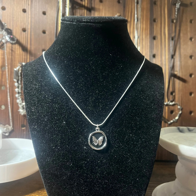 handmade indie plated snake cord necklace with circle silver and black boarder butterfly pendant 1