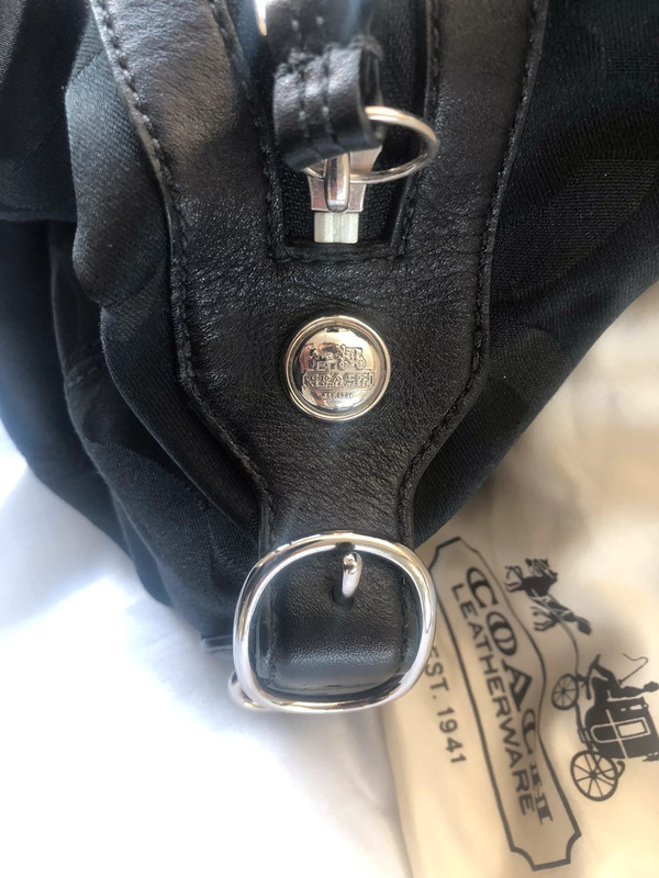 Black coach bag cheap with purple lining