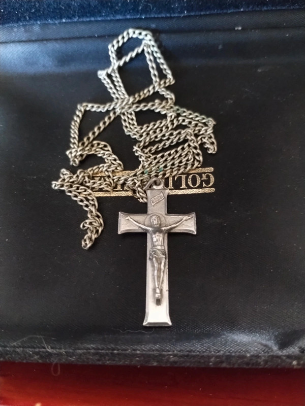 Uniquely exquisite is this 1940s antique cross necklace and chain