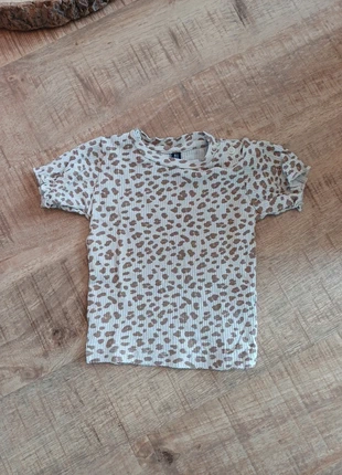 Panter shirtje, marca: New Born, estado: Muito bom, tamanho: 6-9 meses / 68 cm, €1.25, €2.01 inclui Proteção do Comprador